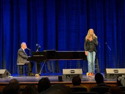 Emily singing at Jim Caruso's Cast Party with Billy Stritch on the keys.